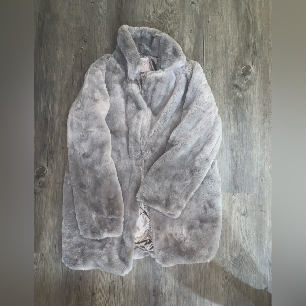 never worn furry jacket